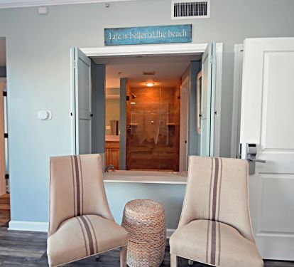 View into master bathroom to walk in shower