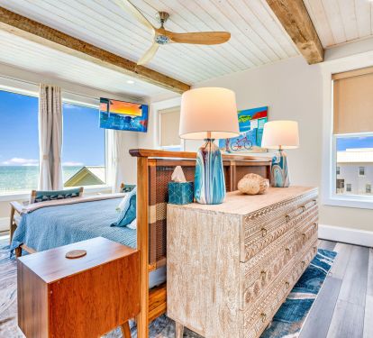 Master suite with furnishings handmade from Costa Rica. Full ocean views