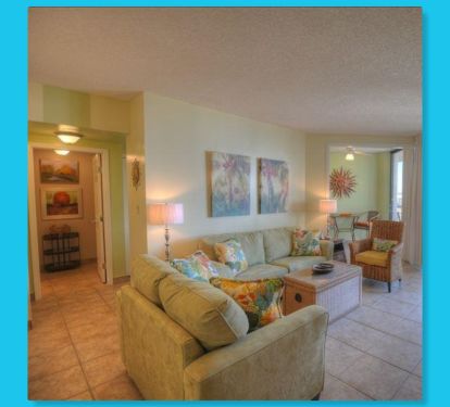 The view into the living room and to the left the master suite.
