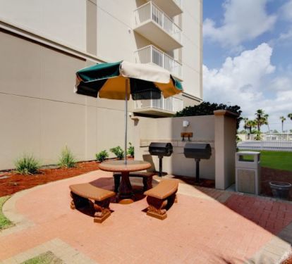 Charcoal grills and seating area for outdoor grilling and dining