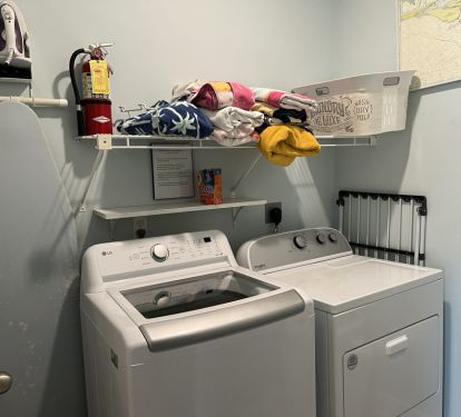 Laundry room super nice washer and beach towels
