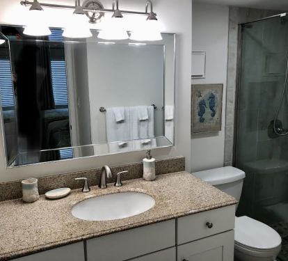 Master Bath features a large vanity, comfort height toilet, and walk-in shower.