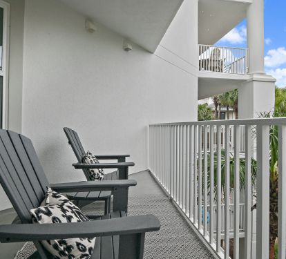 Master Balcony With 2 Chairs and a Table 