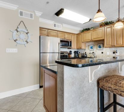 Kitchen has two bar stools!