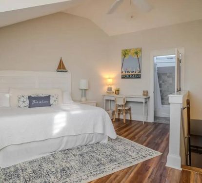 King size primary suite with dedicated workspace