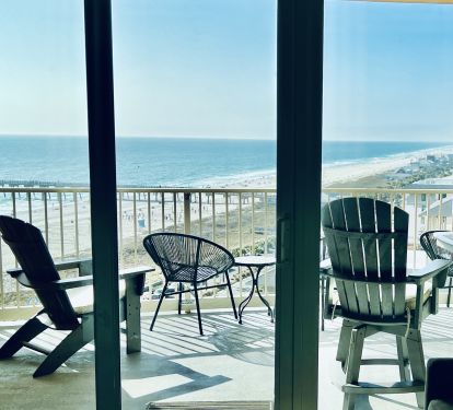 EAT OUT! Enjoy the hi-boy swivel chairs and dining table on Mermaid's balcony!