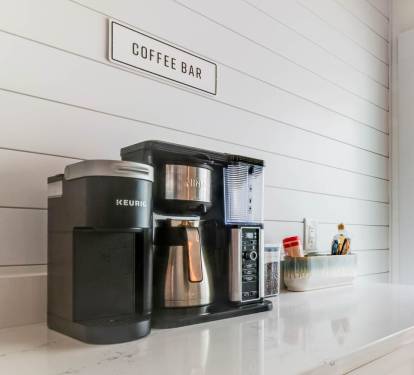 Coffee bar with syrups and cream 