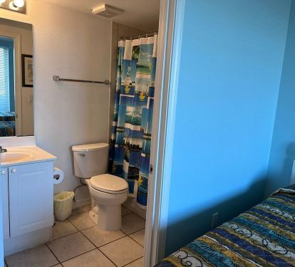 Bedroom #3 with 2 twin beds and access to bath #3