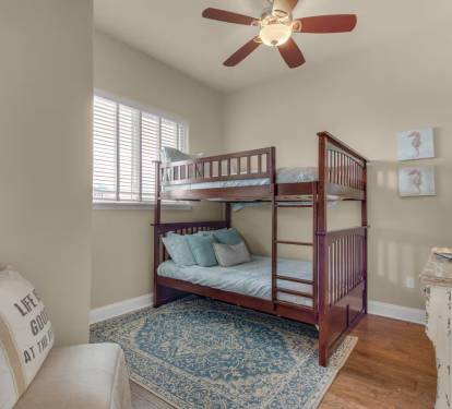 Bunk room: 2 full size beds with dresser and smart TV