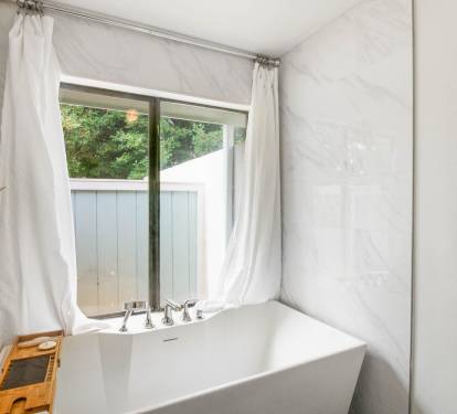 Custom Bathroom with free standing tub and epsom salt for soaking. 
