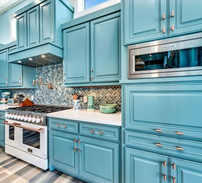Handmade custom wood cabinetry. Professional appliances throughout the home