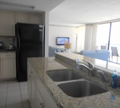 GRANITE COUNTERTOPS. WELL STOCKED KITCHEN 