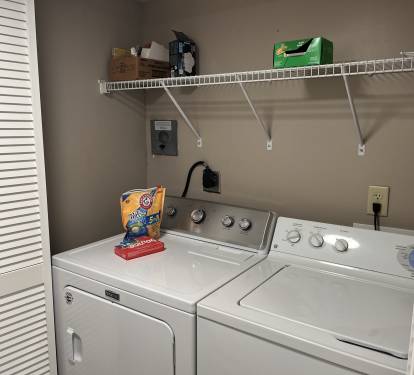 Large washer and dryer in hall closet