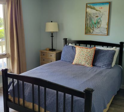 Ground floor guest BR has king bed, attached bath