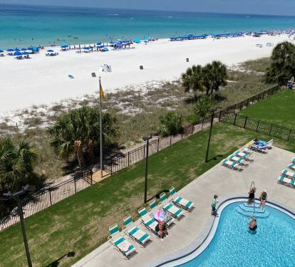 Balcony Overlooking 1 of 2 Heated Pools and Jacuzzis - Minutes from the Condo