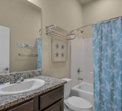 Full bathroom #2: Tub shower and spacious countertops