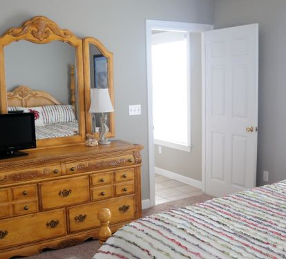 Dresser in the first floor master facing the door