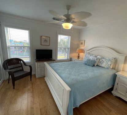 Upstairs Front Queen Bedroom with all new furniture and Hall Bathroom
