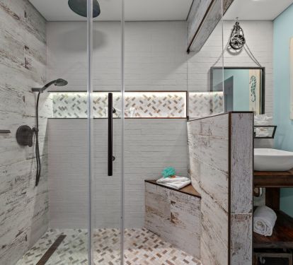 Spacious walk in  shower with seat