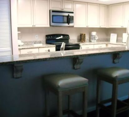 Granite counter tops, full kitchen, ice maker, microwave.