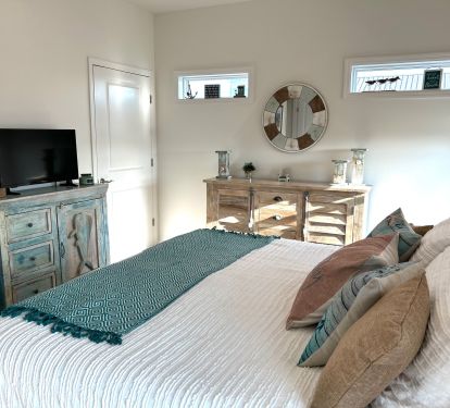 downstairs king bedroom with attached bathroom