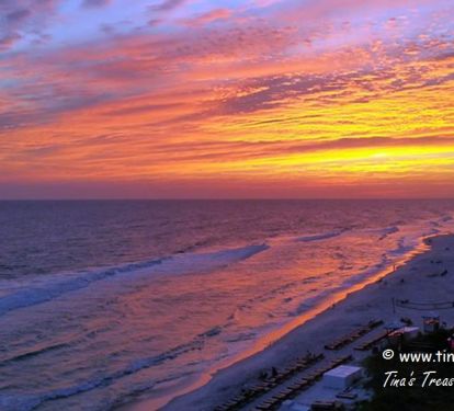 View of the sunset from 802 sq ft wrap around balcony overlooking Gulf of Mexico
