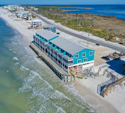 Right on the water with beach access at both ends