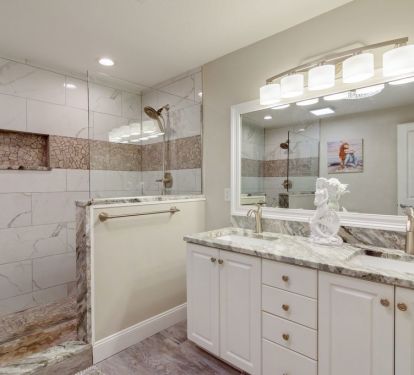 Master bath with wall to wall shower, bench seat and two shower heads!