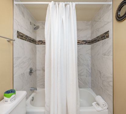 The third bathroom also has a new beautiful marble-look tile 