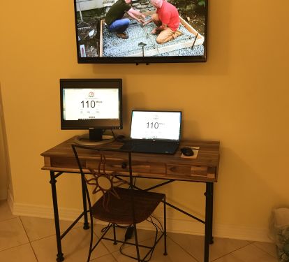 A desk &amp; a 19 in. monitor are in the master bedroom to facilitate work from home