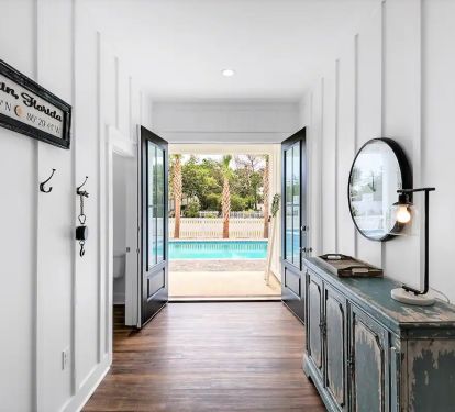 Sundance-21 front doors open to its full-sized pool with cascading spa.
