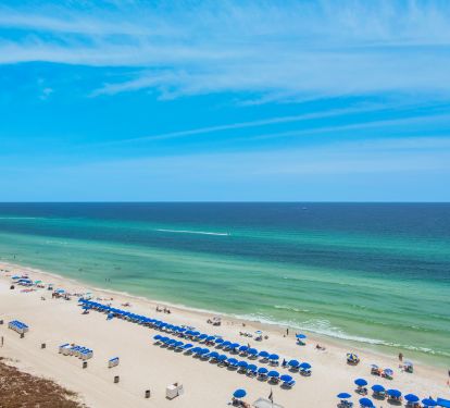 Two reserved beach chairs with umbrella included in rental.
