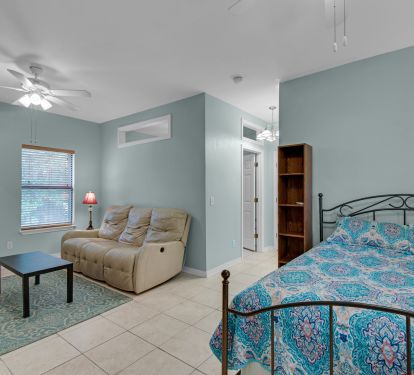 In-law suite has queen bed.
