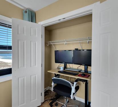Adjustable height hidden work station w/ dual monitors &amp; docking station w/ view