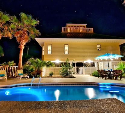 Nighttime view of Sea Breeze pool area