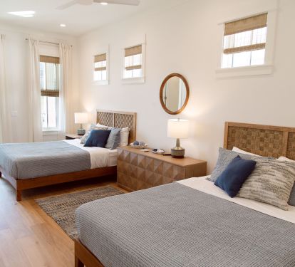 2nd floor family bedroom - 2 queen beds - on-suite bath - access to front porch
