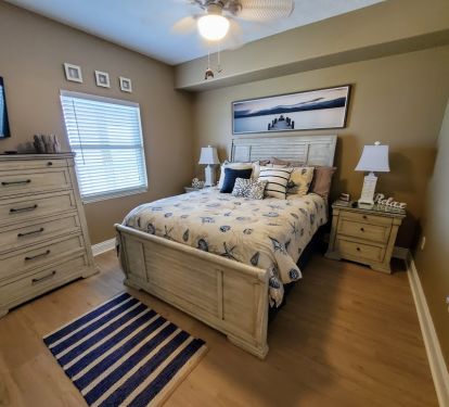 2nd BR has queen bed, 40&rdquo; Smart TV, closet, and attached bathroom w/shower/tub.