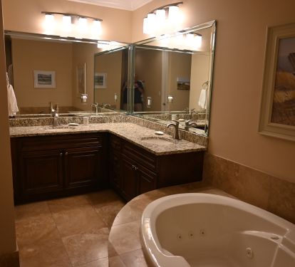En-Suite Master Bath,, 2 Sinks, Whirlpool Tub, Travertine Walk-In Shower.