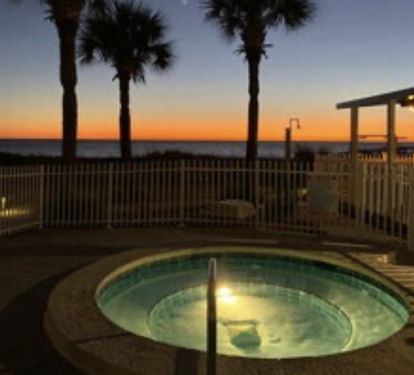 FIRST FLOOR FLIPS FLOPS IS JUST A FEW STEPS FROM THIS HOT TUB PARADISE!