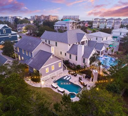 Spacious backyard for games with lush landscaping providing privacy