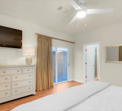 Shipwatch-15...1st floor. Bedroom 1, photo 3. King suite with private full bath, private pool entrance and wall mount TV.