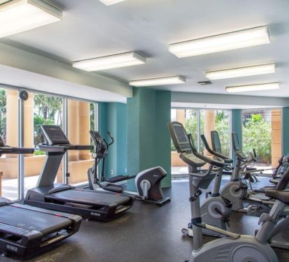 Adult Fitness Center faces the pool