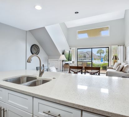 Open floor plan with view of pool from kitchen