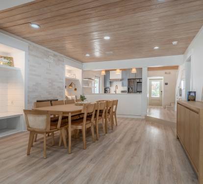 Open floor plan allows easy flow from kitchen, dining to patio and pool.