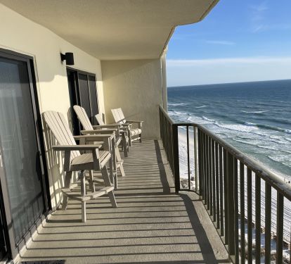 The balcony affords comfortable seating and fabulous views. 