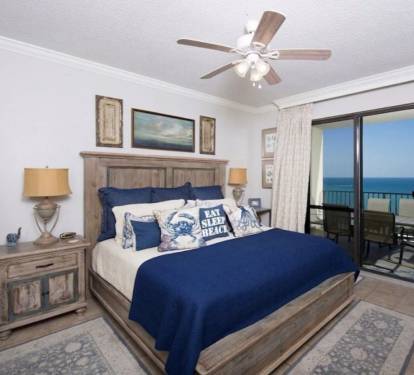 Master Bedroom with king size bed and balcony! Wake up to a view of paradise! 