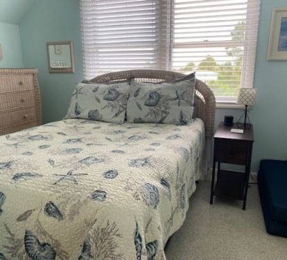 Upstairs East bedroom, full size bed and twin fold out mattress.
