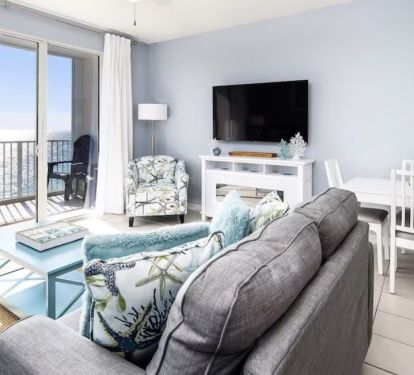 Living room includes a Smart TV and electronic fireplace.