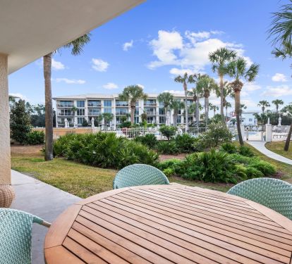 Sit and enjoy your morning coffee or lunch overlooking pool and courtyard.