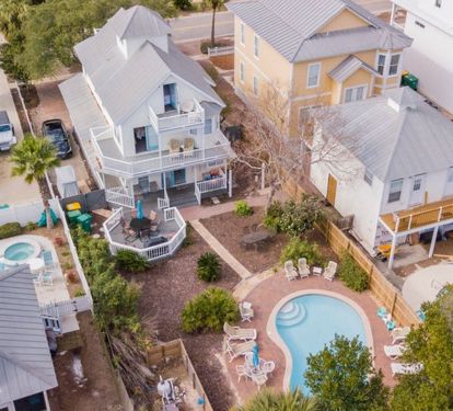 Birdseye view of the beach house and huge backyard area.